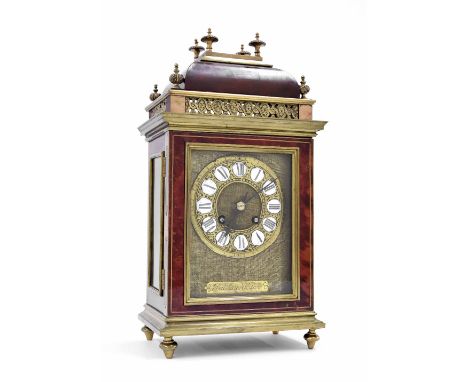 French ormolu and tortoiseshell two train mantel clock, the 4" pierced brass chapter ring with Roman cartouche enamel numeral