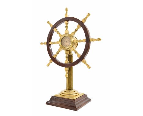 Ormolu and mahogany novelty ship's wheel clock, the 1.75" dial bearing the maker's trademark logo TH, within a drumhead casin