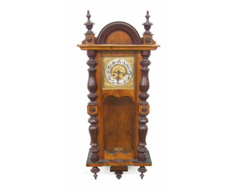 Walnut two train Vienna regulator wall clock, the 7" square brass dial plate with silvered chapter ring enclosing a foliate c
