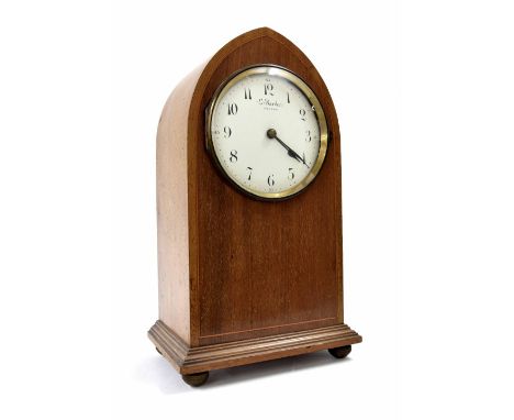 L. Bardon electric mantel clock, the 5.25" white dial within a mahogany lancet case inlaid with boxwood lines and supported u