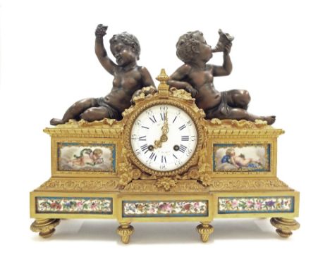 Good French ormolu and porcelain mounted two train mantel clock, the movement stamped Hy Marc, with outside countwheel and st