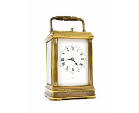 Small repeater carriage clock striking the hours and quarters on two gongs, the back plate stamped with the maker's initials 