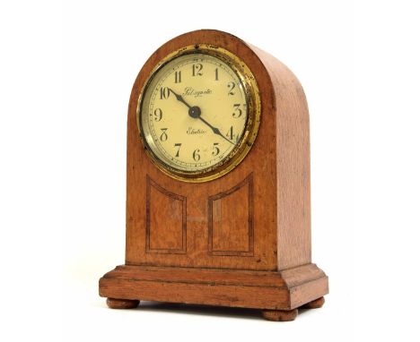 Pulsynetic electric slave mantel clock, the 4.5" cream dial within a rounded arched inlaid case, 12" high
