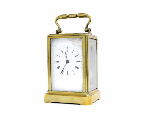 Brass carriage clock striking on a bell and in need of restoration, 6.5" high