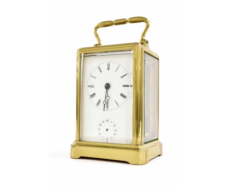 Carriage clock timepiece with alarm striking on a bell, within a corniche style brass case, 5.75" high, also with outer Moroc