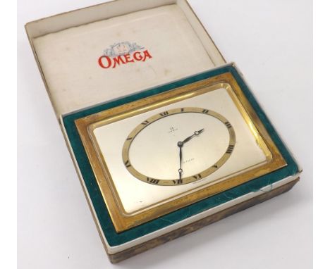 Omega 8 days gilt metal desk clock, the 5'' signed rectangular silvered dial with Roman numeral chapter ring and blued steel 