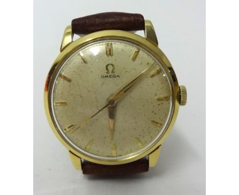 Gents 18ct yellow gold round Omega mechanical manual wind watch oyster coloured dial depicting baton markings on brown leathe
