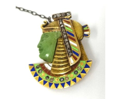 An Egyptian revival brooch set in gilt metal, with diamonds, enamel and possibly jade, no markings, approximately 30mm x 25mm