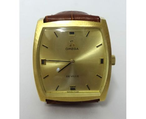 Gents 18ct yellow gold Omega De Ville Tonneau shaped mechanical manual wind watch champagne dial depicting baton markings on 