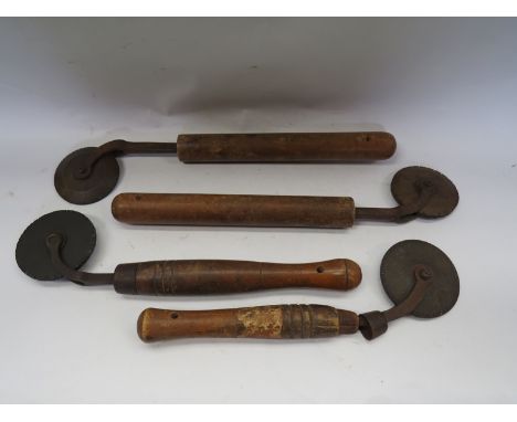 Four vintage leather embossing roller tools