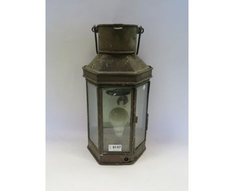 A brass 1916 stable lamp, converted to electric  