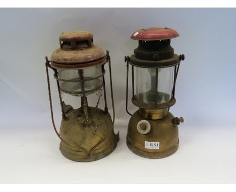 A Tilley lamp and a Bialaddin Model 300x lamp 