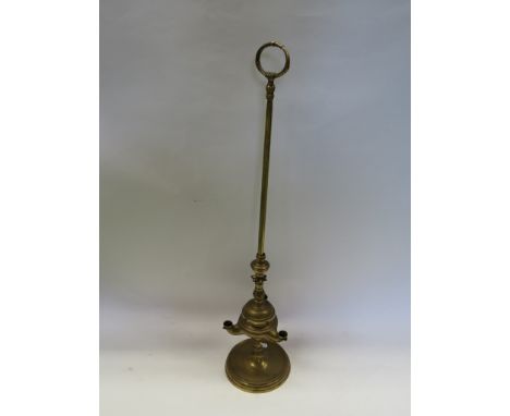 A brass three spout oil lamp 