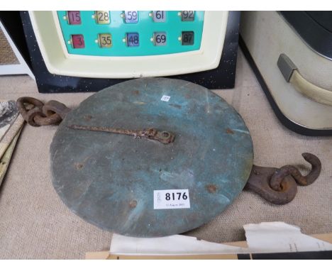 A brass faced hanging scale 