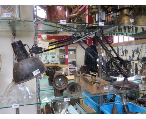 An industrial angle poise lamp 