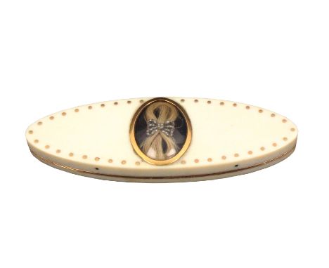 A Georgian ivory toothpick box of navette form the hinged cover with central hair memorium with a diamond set bow under glass