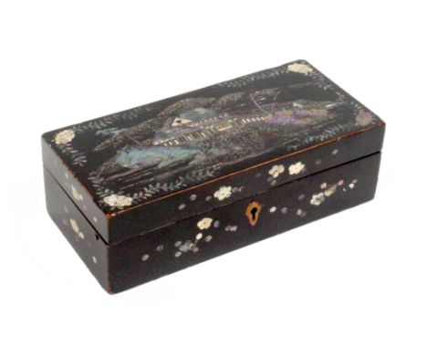 An unusual Japanese black lacquer and pearl inlaid netting box, circa 1830, the lid with a view of a house by water with moun