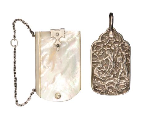 Two 19th Century swivel form notelets comprising a silver example the covers decorated with cherubs collecting fruit and gard