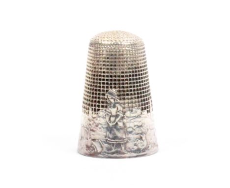 A French silver 'fairy tale' thimble, 'The Milkmaid and the Pot of Milk', with gate, village scene, signed initials SEMG for 