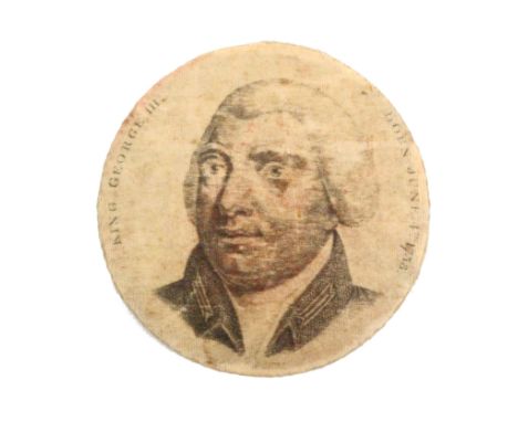 A rare printed silk pin disc one side with a bust portrait titled 'King George III Born June 4th 1738' the obverse with a fem
