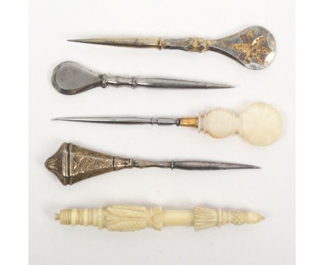 Five 19th Century stilettos comprising a Palais Royal style example with gilt mounted mother of pearl handle, 8cm, a carved i