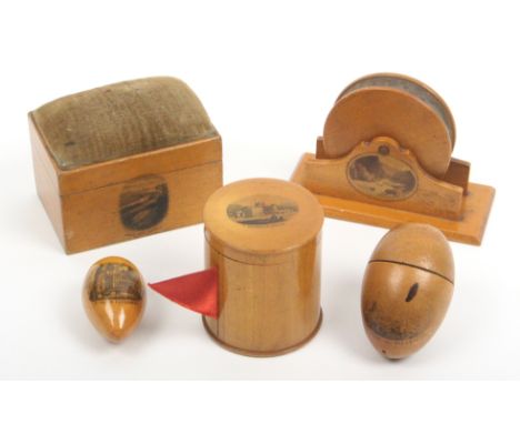 Mauchline ware - five pieces comprising a pin cushion in the form of a knife grinder (photographic/title unclear), 11.5cm, a 