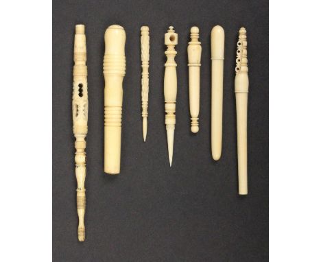 Various sewing tools and other items, comprising a 19th Century slender ivory needle case with pierced cover, three others on