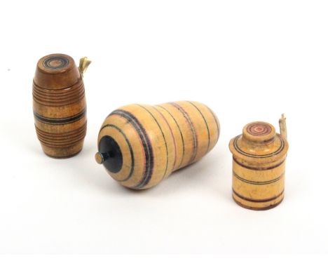 Two early painted Tunbridge ware tape measures and a thimble case, comprising a barrel from example with inked tape, 3cm, ano