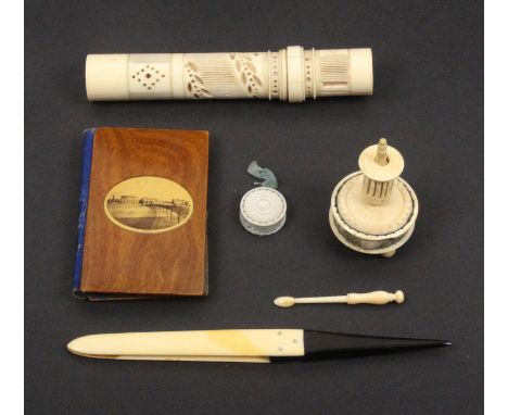 A mixed lot - sewing - comprising a Mauchline ware needle book (photographic - Rhyl), 9 x 5.5cm, a bone combination tape meas