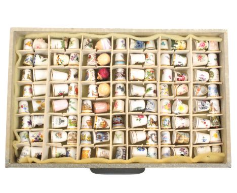 Modern thimbles - ceramic including Royal Worcester and Crown Derby, 150+ in fitted drawers