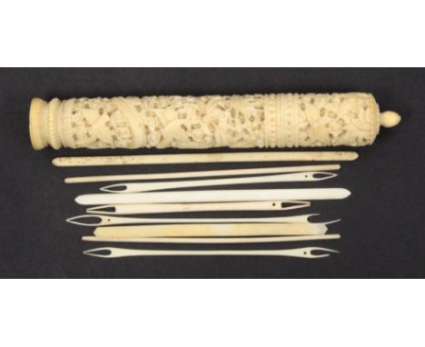 A 19th Century Cantonese carved ivory netting case of tapering cylinder form decorated with dragon, birds and other motifs, w
