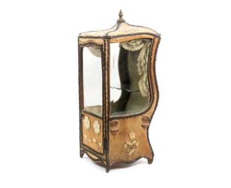 A 19th Century model of a sedan chair fitted as a display cabinet, the carcass covered in faded red fabric with floral appliq