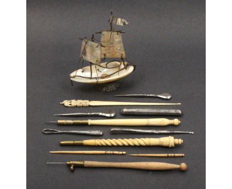 A mixed lot - sewing - comprising a mother of pearl pin dish and thimble stand modelled as a sailing boat, 8cm, three tambour