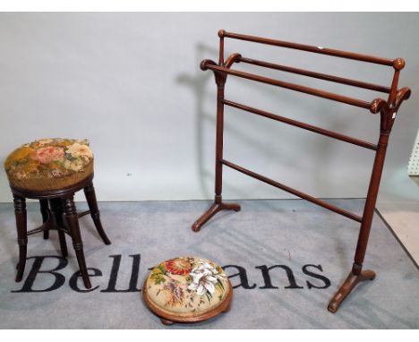 A Victorian mahogany framed piano stool, 32cm wide x 49cm high, a Victorian mahogany framed circular footstool, 32cm diameter
