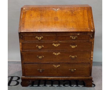 A late George II walnut bureau with two short and three long drawers on bracket feet, 92cm wide x 103cm high.