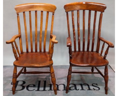 A near pair of 19th century ash and elm stick back open armchairs, ring tuned supports, 57cm wide x 114cm high, (2). 