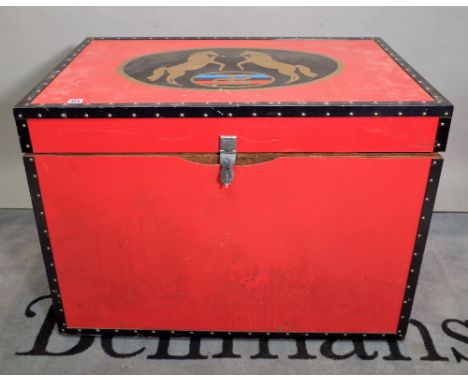 A 20th century red lacquer and studded lift top trunk, 93cm wide x 68cm high. 