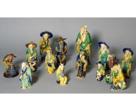 A group of thirteen Asian ceramic figures, the tallest 16cm (13).