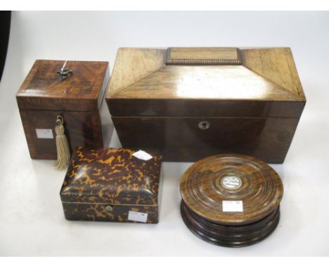 A George III mahogany cube shaped tea caddy, a Regency rosewood sarcophagus tea caddy, a tortoiseshell box, one other box (4)