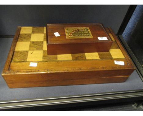 Rosewood and boxwood chequer inlaid folding mahogany games box with playing pieces' and 'Reversi' draughts-type game with ins