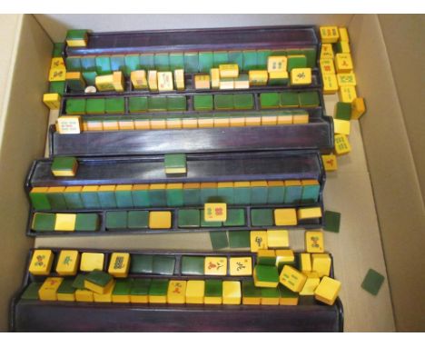 A Mah Jong playing tiles and four tile stands  