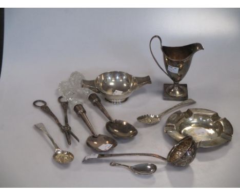 A pair of silver grape shears, together with a toddy ladle, a pair of berry spoons, a caddy spoon, a pair of salad servers wi