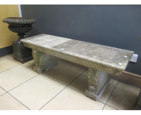 A stone garden bench  