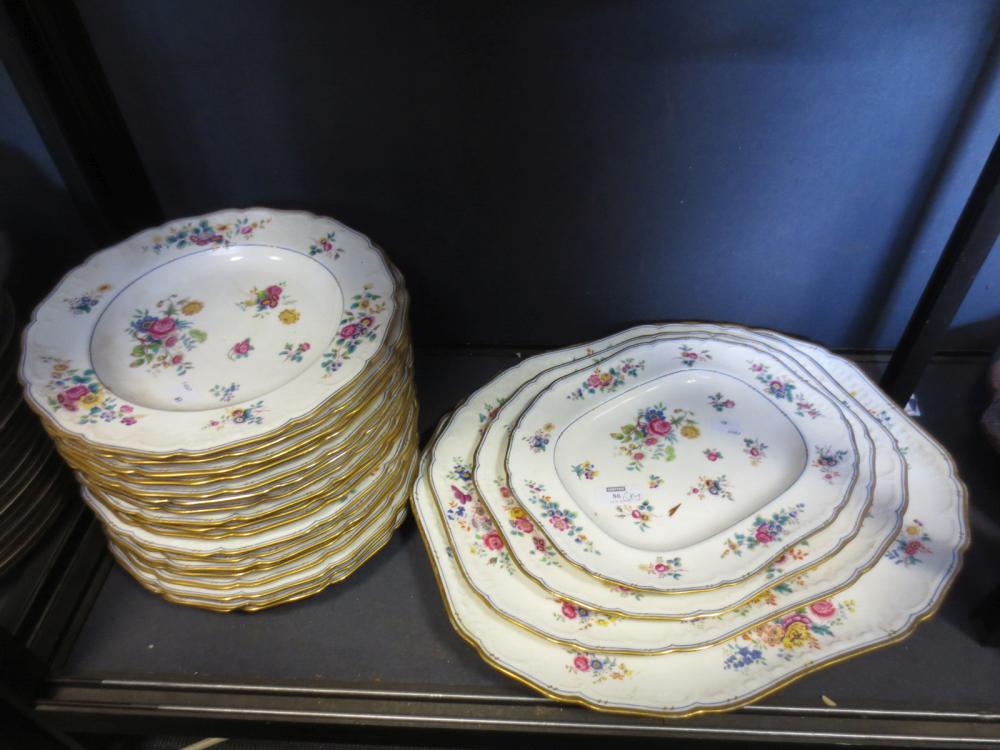 An early 19th century English porcelain dinner service, decorated in