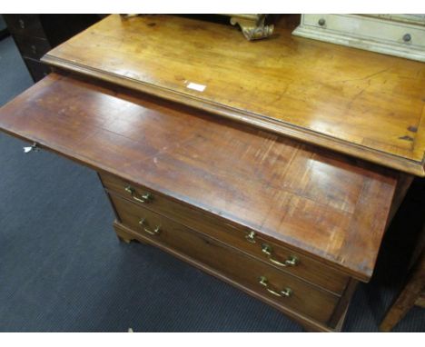 A George III mahogany and crossbanded chest of 4 long drawers, and brushing slide 81 x 85 x 46 cm  