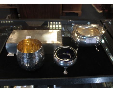 A silver tub salt with liner, a silver sugar basin, a silver table ciagrette box and an unhallmarked barrel shaped cup stampe