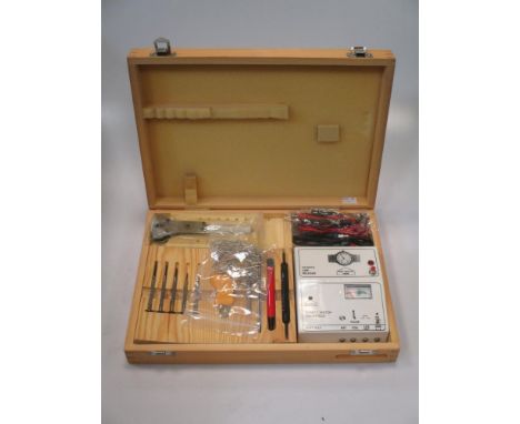 A cased set of watchmakers' tools  