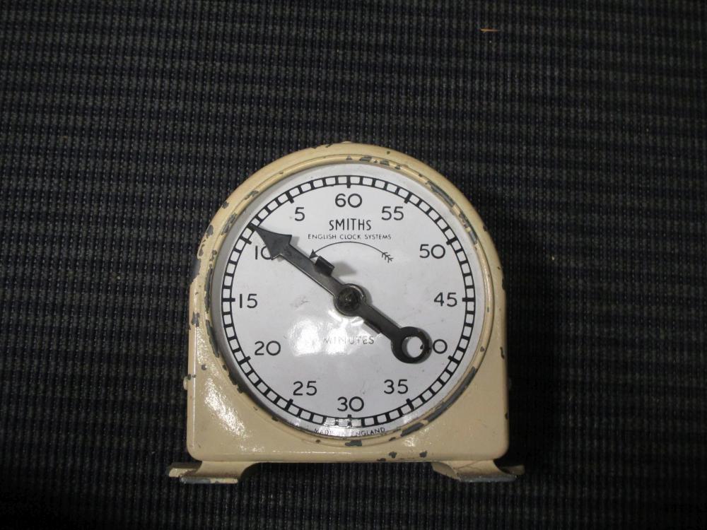 Three anniversary clocks with domes, various clock spares and parts