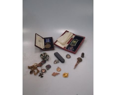 Two 9ct gold medals together with a gate bracelet and two lady's wristwatches on expanding bracelets, 58.4g gross inc movemen