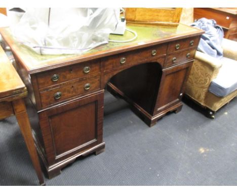 A 19th century mahogany twin pedestal desk, with adpated drawers, 75 cm x 123 cm x 63 cm  